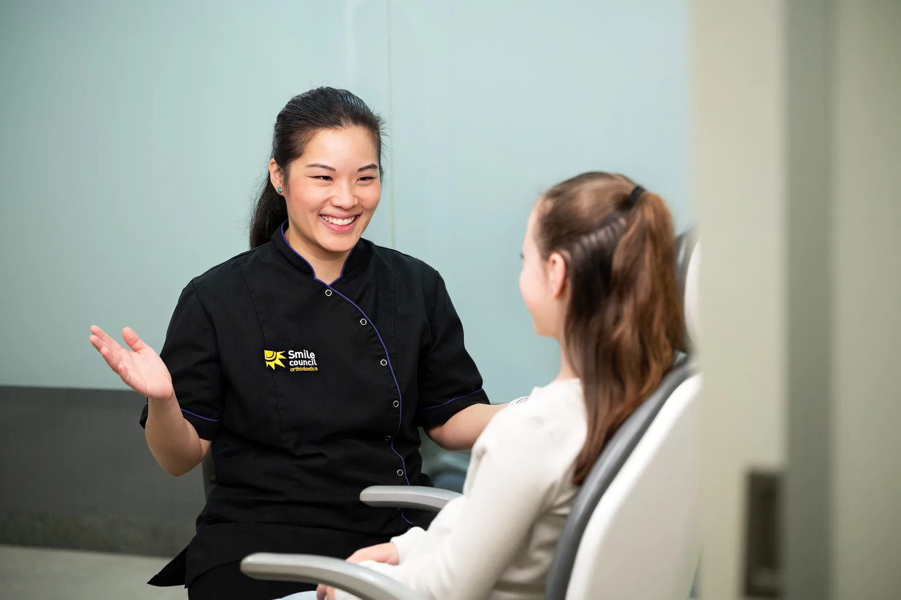 Smile Council staff consulting with a patient
